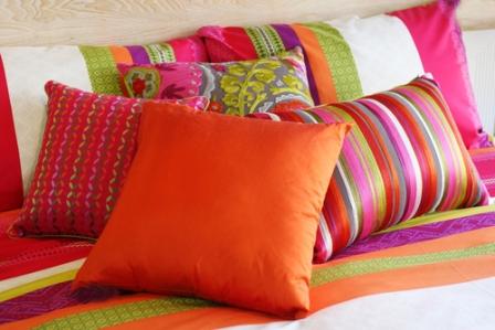 http://orgjunkie.com/wp-content/uploads/2011/03/colorful-pillows1.jpg