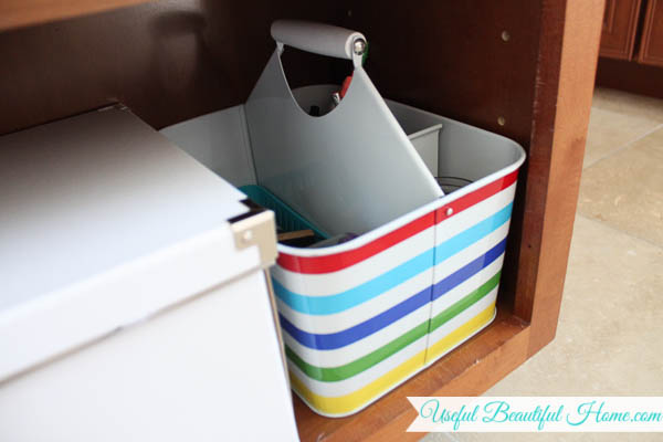 using a homeschool caddy helps keep things organized at the kitchen table
