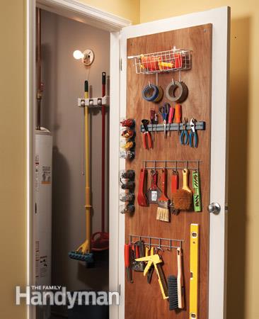 organize garage tools on back of door