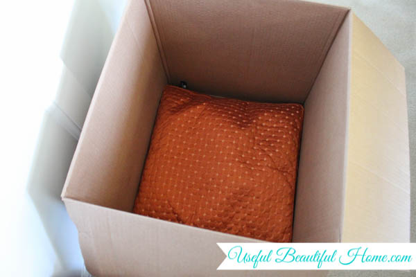 Use pillows adn linens as extra padding inside your moving boxes